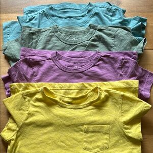 4 Primary Short Sleeve Tees.  Great Condition.